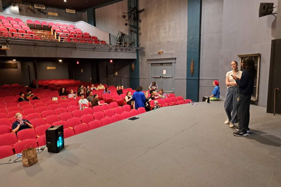 Brice Stone and Cameron Stevens preparing to teach onstage