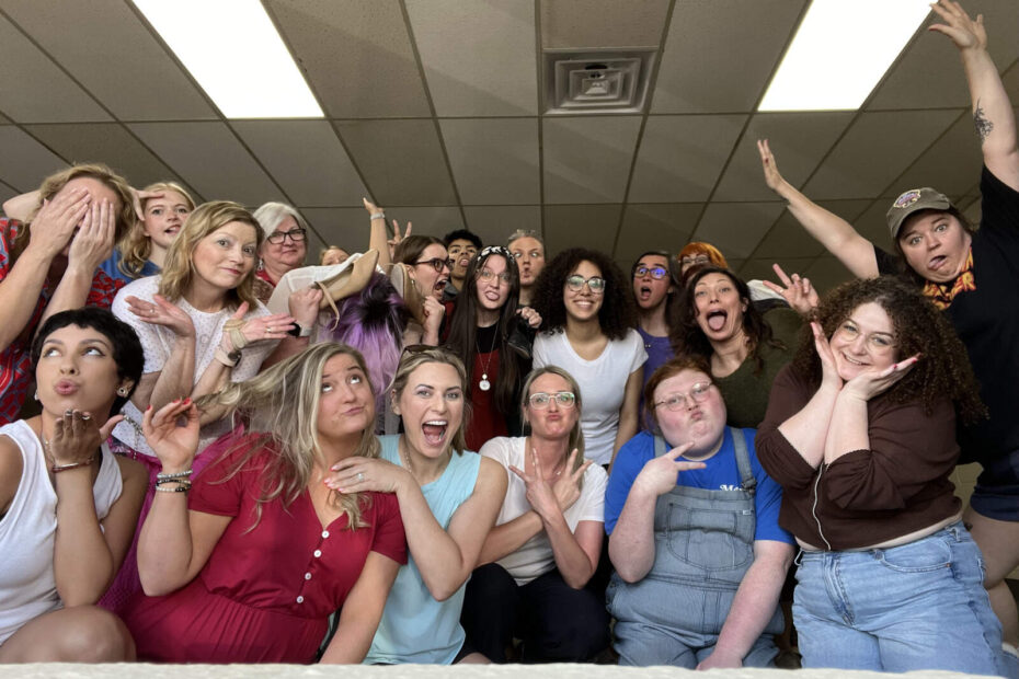 Cast members playing the ladies in Cinderella making silly faces and striking playful poses